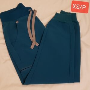 Used figs jogger scrub pant  XS/P  Pacific blue.In good condition